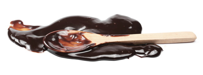 Melted chocolate, icing for cake and ice cream isolated on white background