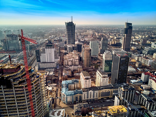WARSAW, POLAND - FEBRUARY 10, 2019: Beautiful panoramic aerial drone view to panorama cityscape of Warsaw modern City, Mennica Legacy Tower and "Rondo 1" office skyscraper located at Rondo ONZ