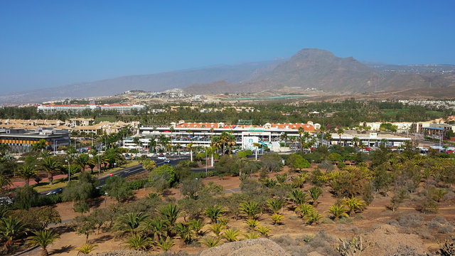 Panoramic inland views of the sprawling resort of Las Americas from Montana Chayofita towards Centro Commercial Parque Santiago 6, Tenerife, Canary Islands, Spain
