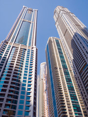 High-rise skyscrapers with blue sky of Dubai city. UAE.