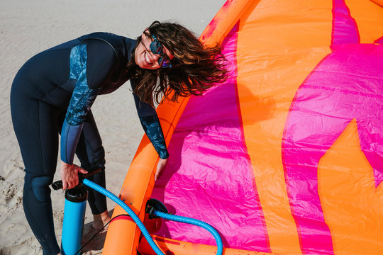 Kitesurf Instructor Preparing kites on the beach
