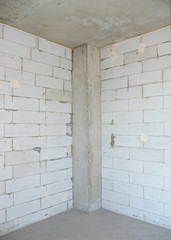 Aerared concrete blocks wall room without plasterwork.