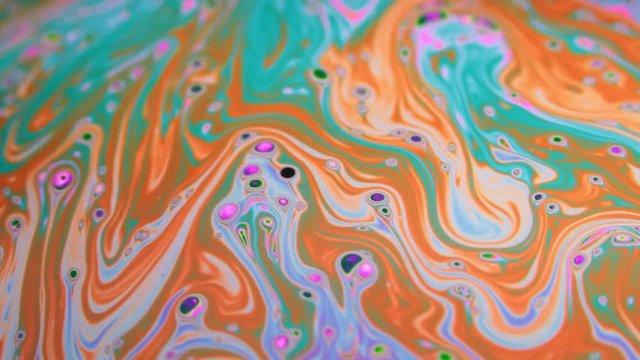 Create abstract background using moving surface of colorful bubble patterns