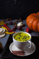 Pumpkin asian coconat cream soup. Autumn hot food