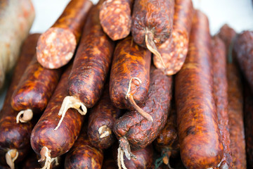 Closeup of traditional hungarian pork sausages for sale on farmers market