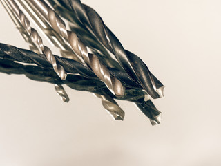 metal drill in assortment on a white background
