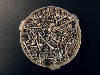 Fototapeta premium screws nuts bolts washers screws loose in assortment