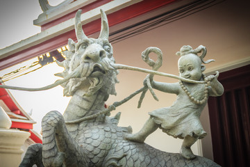 Sculpture of Sudsakhon riding horse named Ninmangkon. Sudsakhon is a fictional character in Sunthorn Phu's story Phra Aphai Mani, written in Thailand during the Rattanakosin period.