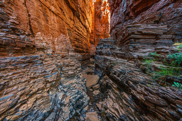 hiking to handrail pool in the weano gorge in karijini national park, western australia 6