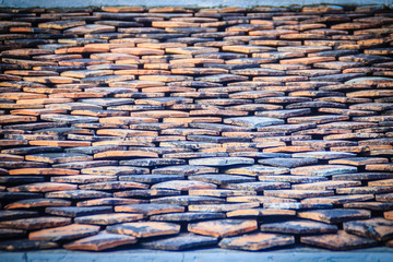 Roof tiles old of classic in Buddhist temple. Old tiled roof tiles from the front view.
