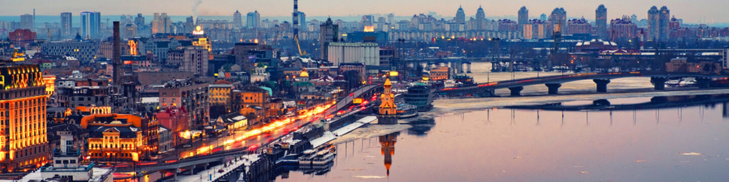 Aerial view of Podol and Dnipro river in the evening in Kyiv, Ukraine