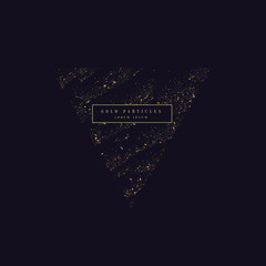 Gold glitter. Shiny particles on a dark background.