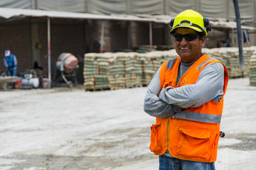 Portrait Of Construction Worker On Building Site.