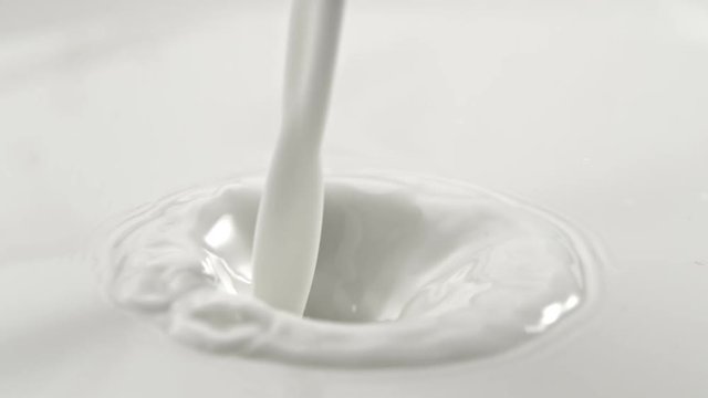 Pouring fresh milk in super slow motion, shooted with high speed cinema camera at 1000fps, 4K.