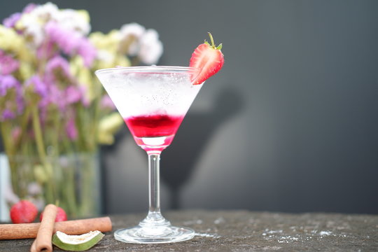 strawberry martini cocktail on table