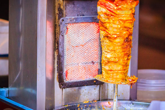 Traditional Turkish food, Doner Kebab in the restaurant. Lamb and Chicken Doner Kebab. Grilled skewered lamb mutton, a traditional meat kebab sandwich.