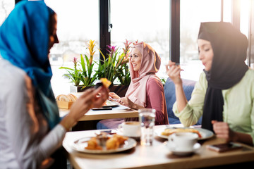 Muslims are having fun at a coffee shop