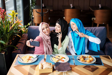 Muslims are having fun at a coffee shop