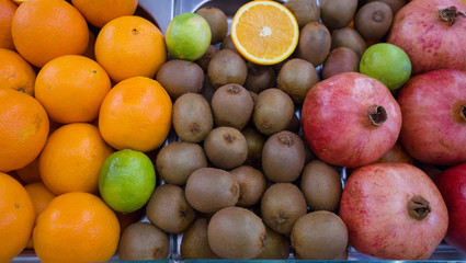 Naklejka na ściany i meble Shelf with ripe fruits. Assorted for fresh juices. Farmer's market.