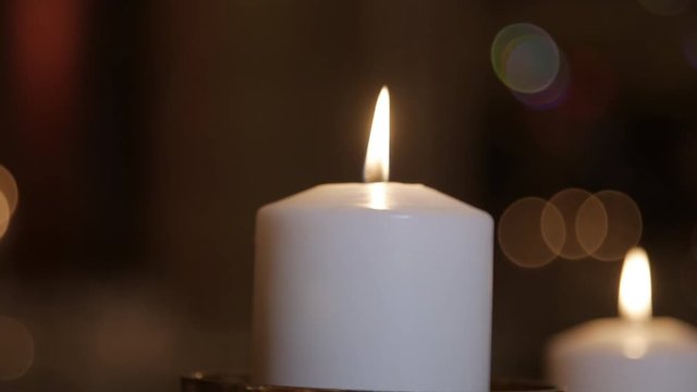 White candle blurry to focus