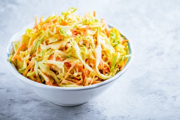 Coleslaw salad with white cabbage, carrots and mayonnaise dressing