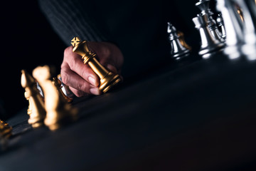 Fototapeta na wymiar chess board game black background business strategy solution ideas concept
