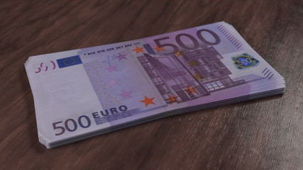 Pack of money. Five hundred euro banknotes on the wooden floor. 500 european cash currency 3D illustration, depth of field.