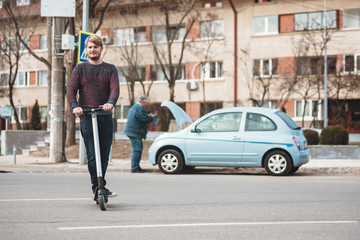 conventional vehicle vs electric vehicle millennials culture riding electric scooter for outdoor personal transportation ecologic alternative e-scooter, electric kickscooter urban transport technology