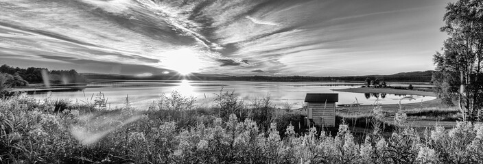 at a river with a sauna hut, black and white version © Dirk