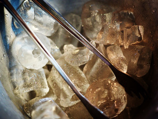 Ice tube whit Ice bucket in restaurant for mix beverage and drinking water.