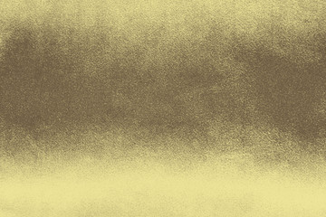 Luxury gold textile background. Silk cloth texture. Fabric pattern.