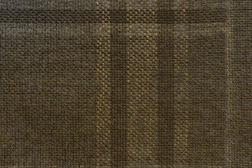 Luxury gold textile background. Silk cloth texture. Fabric pattern.
