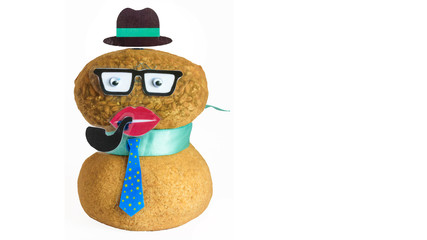 Funny handmade doll made from stockings stuffed with wood shavings and wheat seeds that will sprout as head grass hair.