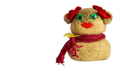 Funny handmade doll made from stockings stuffed with wood shavings and wheat seeds that will sprout...