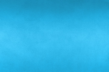 Ocean blue textile background. Silk cloth texture. Fabric pattern.