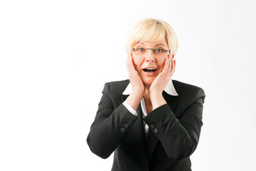 Surprised mature businesswoman