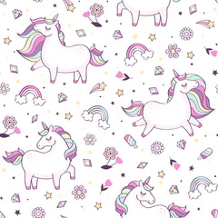 Seamless vector pattern with cute unicorns, stars, rainbows, crystals and flowers. Magical unicorn background