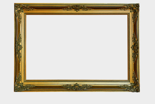 Ornamental wooden gold frame isolated with clipping path