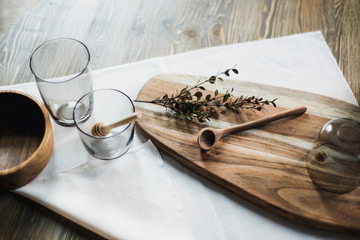 still life kitchen table, wooden board, vase