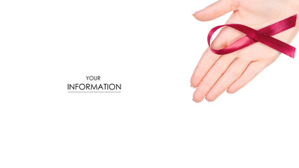 Hand holding red ribbon of world aids day pattern on a white background isolation