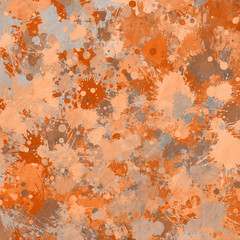 Orange paint splatter effect texture on gray paper background. Artistic backdrop. Different paint drops. Rusted metal.