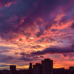 texture of beautiful and colorful sunset sky with a living city building