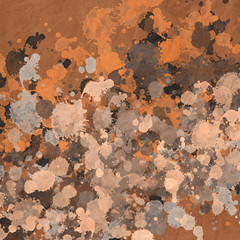 Orange paint splatter effect texture on gray paper background. Artistic backdrop. Different paint drops. Rusted metal.