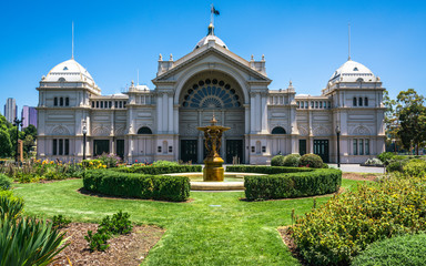 Royal Exhibition Building east side and Carlton Gardens with fountain view in Melbourne VIC...