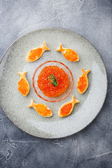 Delicious appetizer with red caviar.