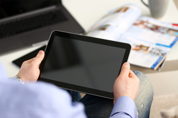 Businessman arm using modern pc pad closeup