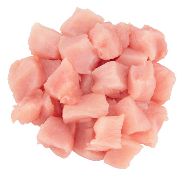 Top view of raw chicken fillet chunks isolated on white