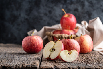 Fresh apples on wooden background.