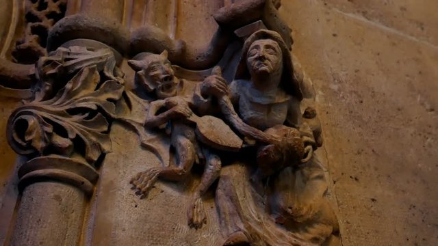 ornaments and sculptures of the Gothic period on the gates of a church in Valencia