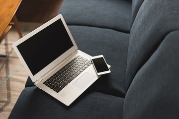 laptop on sofa